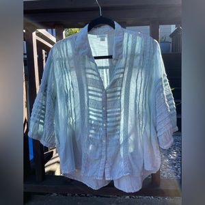 Sundance, aqua blouse.